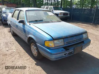 1992 Ford Tempo z VIN 1FAPP36U6NK188935, wystawiony jako IAAI lot #42133598 z przebiegiem 31 673 mil mil oraz . Historia ofert i sprzedaży dostępna na DreamBid. Obrazek 1.