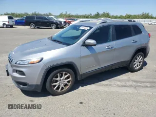 2016 Jeep Cherokee Altitude with VIN 1C4PJLCB1GW287222, listed as a Copart auction lot 64301365 with 144,658 mi miles and Clean title. Bid and sale history available at DreamBid. Image 1.