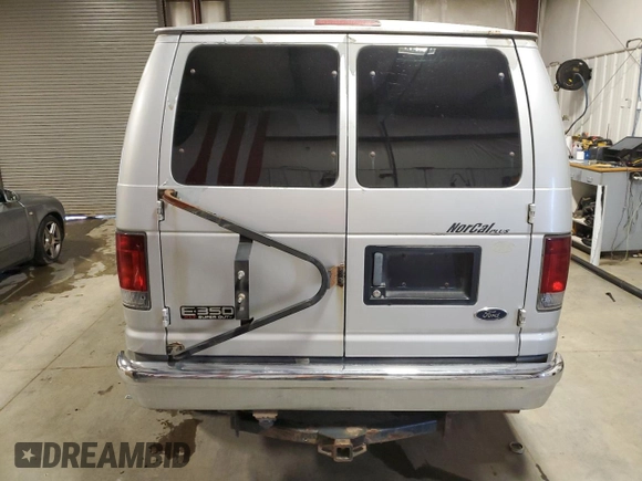 2005 Ford Econoline Passenger XL with VIN 1FBNE31L85HA52006, listed as a Copart auction lot 70610014 with 182,806 mi miles and Clean Title. Bid and sale history available at carsss.com. Image 6.