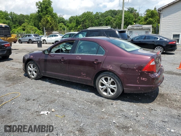 2012 Ford Fusion SE z VIN 3FAHP0HAXCR253297, wystawiony jako Copart lot #60302645 z przebiegiem 138 619 mil mil oraz Szkoda całkowita • Salvage title. Historia ofert i sprzedaży dostępna na DreamBid. Obrazek 2.