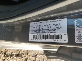 2015 Mazda 3 i SV with VIN JM1BM1T74F1231241, listed as a Copart auction lot 45702375 with 216,817 mi miles and Salvage Title. Bid and sale history available at DreamBid. Image 12.