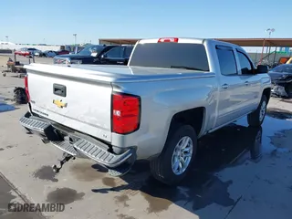 2018 Chevrolet Silverado 1500 LT with VIN 3GCPCRECXJG159263, listed as a IAAI auction lot 41856210 with 184,020 mi miles. Bid and sale history available at carsss.com. Image 4.