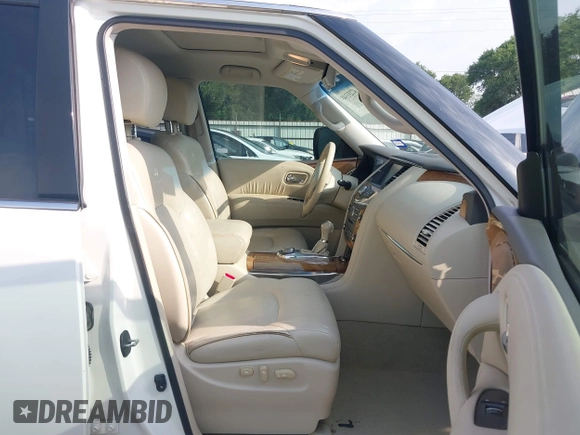 2014 Infiniti QX80 z VIN JN8AZ2NE6E9063136, wystawiony jako IAAI lot #42233348 z przebiegiem 145 988 mil mil oraz . Historia ofert i sprzedaży dostępna na DreamBid. Obrazek 5.
