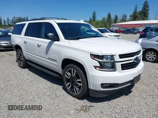 2019 Chevrolet Suburban Premier z VIN 1GNSKJKJ6KR270855, wystawiony jako IAAI lot #42345361 z przebiegiem 71 705 mil mil oraz . Historia ofert i sprzedaży dostępna na DreamBid. Obrazek 1.