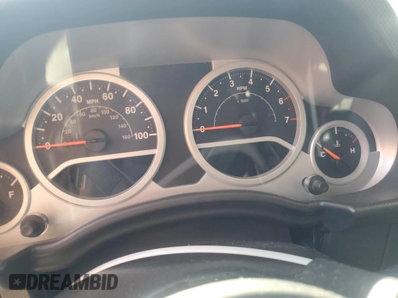 2010 Jeep Wrangler Sahara с VIN 1J4GA5D16AL225139, выставлен на аукционе Copart как лот 77114204 с пробегом Не указан миль и Списание • Salvage title. История ставок и продаж доступна на DreamBid. Изображение 9.