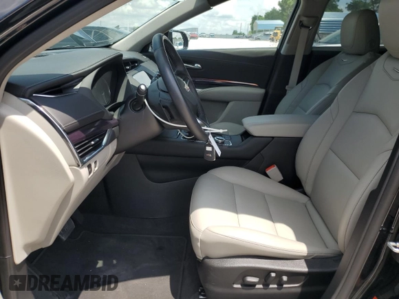 2023 Cadillac XT4 FWD Luxury с VIN 1GYAZAR47PF107473, выставлен на аукционе Copart как лот 59137665 с пробегом 9 198 миль миль и Списание • Salvage title. История ставок и продаж доступна на DreamBid. Изображение 7.