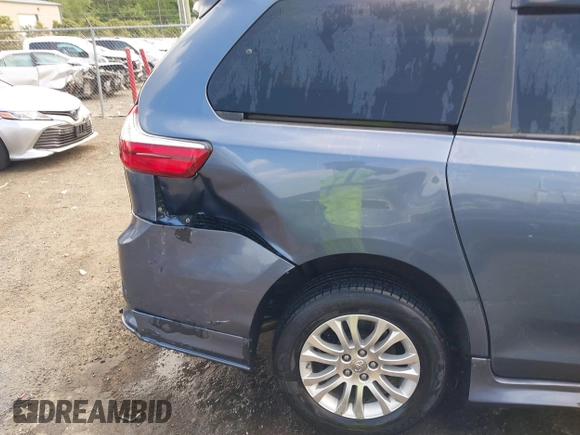 2016 Toyota Sienna XLE z VIN 5TDYK3DC2GS739042, wystawiony jako IAAI lot #42163983 z przebiegiem 98 842 mil mil oraz . Historia ofert i sprzedaży dostępna na DreamBid. Obrazek 19.