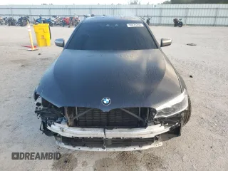 2019 BMW 5 Series M550i xDrive with VIN WBAJB9C57KB288906, listed as a Copart auction lot 79846274 with 61,744 mi miles and Salvage title. Bid and sale history available at DreamBid. Image 5.