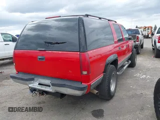 1996 Chevrolet Suburban with VIN 1GNGK26J6TJ327156, listed as a IAAI auction lot 41858544 with 195,532 mi miles. Bid and sale history available at carsss.com. Image 4.