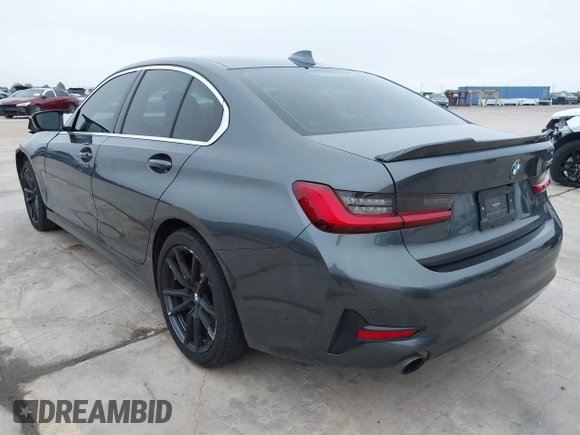 2021 BMW 3 Series 330i with VIN 3MW5R1J09M8C15403, listed as a IAAI auction lot 41892341 with 30,975 mi miles and . Bid and sale history available at carsss.com. Image 3.