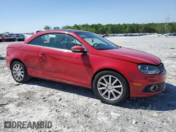 2013 Volkswagen Eos Komfort with VIN WVWBW8AH7DV000421, listed as a Copart auction lot 51988795 with 102,155 mi miles and Salvage Title. Bid and sale history available at DreamBid. Image 4.