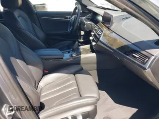 2019 BMW 5 Series 540i with VIN WBAJE5C55KWW11827, listed as a IAAI auction lot 42191127 with 72,113 mi miles and . Bid and sale history available at DreamBid. Image 5.