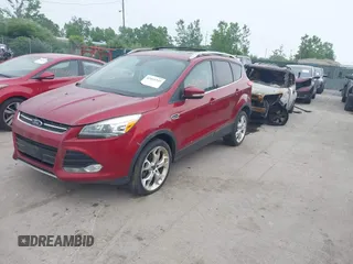 2013 Ford Escape Titanium с VIN 1FMCU9J96DUD76537, выставлен на аукционе IAAI как лот 42415225 с пробегом Не указан миль и . История ставок и продаж доступна на DreamBid. Изображение 2.