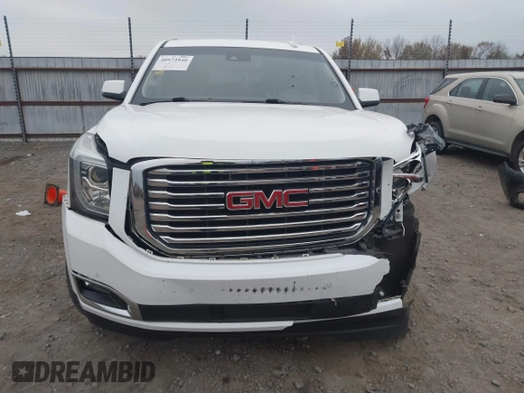 2018 GMC Yukon SLT with VIN 1GKS1BKC3JR279163, listed as a IAAI auction lot 40973940 with 122,445 mi miles. Bid and sale history available at carsss.com. Image 12.