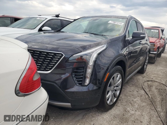 2022 Cadillac XT4 FWD Premium Luxury z VIN 1GYFZCR44NF166169, wystawiony jako Copart lot #77981414 z przebiegiem 9 734 mil mil oraz Nie do naprawy • Non repairable. Historia ofert i sprzedaży dostępna na DreamBid. Obrazek 5.