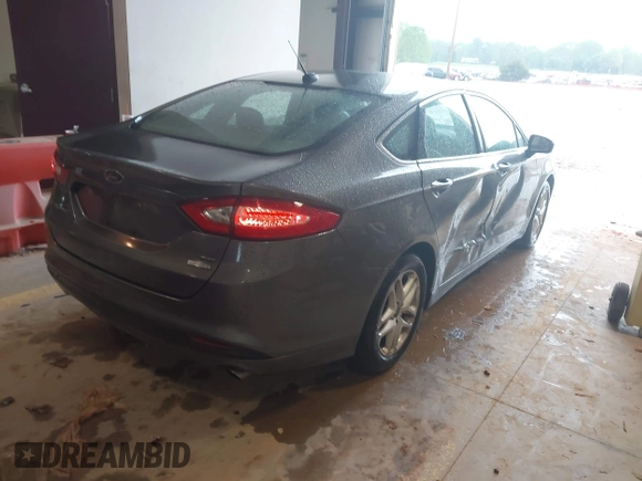 2014 Ford Fusion SE with VIN 1FA6P0HDXE5389873, listed as a IAAI auction lot 41976851 with 175,182 mi miles. Bid and sale history available at carsss.com. Image 4.