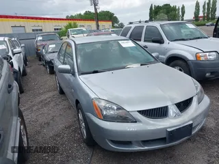 2005 Mitsubishi Lancer ES with VIN JA3AJ26E75U053731, listed as a IAAI auction lot 36830857 with Not provided miles and . Bid and sale history available at DreamBid. Image 1.