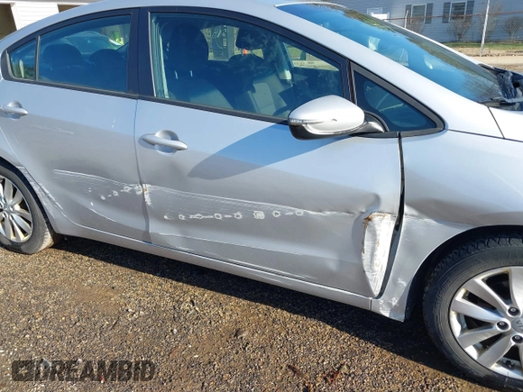 2016 Kia Forte LX with VIN KNAFX4A66G5471080, listed as a IAAI auction lot 41812751 with 57,686 mi miles. Bid and sale history available at carsss.com. Image 6.