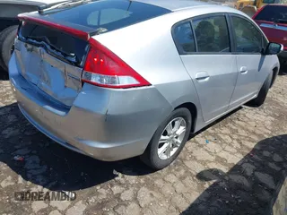 2010 Honda Insight EX with VIN JHMZE2H75AS013109, listed as a IAAI auction lot 41976886 with 226,434 mi miles and . Bid and sale history available at DreamBid. Image 4.
