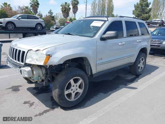 2006 Jeep Grand Cherokee Laredo with VIN 1J4GR48K46C308811, listed as a IAAI auction lot 42044167 with 190,613 mi miles. Bid and sale history available at carsss.com. Image 2.