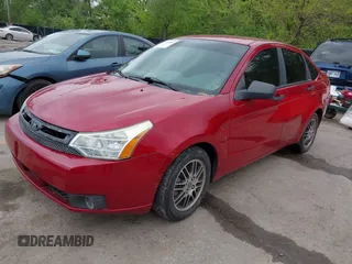 2010 Ford Focus SE with VIN 1FAHP3FN5AW160169, listed as a IAAI auction lot 42136904 with 146,605 mi miles. Bid and sale history available at carsss.com. Image 2.
