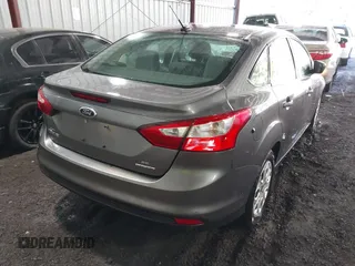 2012 Ford Focus SE with VIN 1FAHP3F21CL408430, listed as a IAAI auction lot 42286632 with 140,387 mi miles and . Bid and sale history available at DreamBid. Image 4.