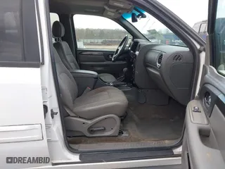 2004 GMC Envoy XUV SLE with VIN 1GKES12S846143483, listed as a IAAI auction lot 41500608 with 242,926 mi miles. Bid and sale history available at carsss.com. Image 5.