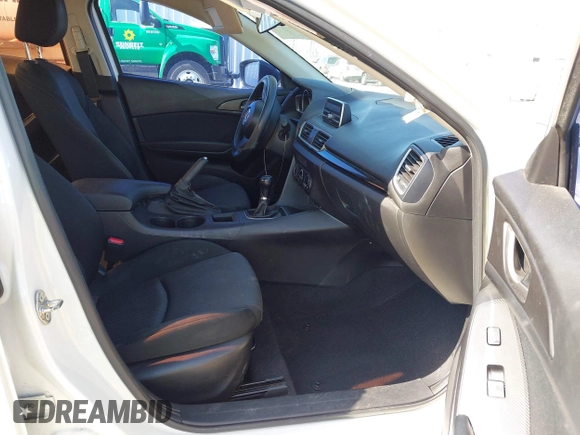 2015 Mazda 3 i SV with VIN JM1BM1T71F1218642, listed as a IAAI auction lot 42142795 with 134,143 mi miles. Bid and sale history available at carsss.com. Image 5.
