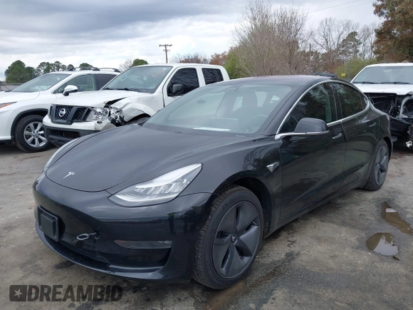 2019 Tesla Model 3 Mid Range with VIN 5YJ3E1EA3KF313425, listed as a IAAI auction lot 41806388 with 110,767 mi miles and . Bid and sale history available at carsss.com. Image 17.