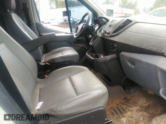 2016 Ford Transit Cargo with VIN 1FTYR1ZM7GKA14464, listed as a IAAI auction lot 41230405 with 120,604 mi miles and . Bid and sale history available at DreamBid. Image 5.