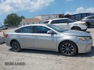 2018 Toyota Avalon XLE with VIN 4T1BK1EB7JU281738, listed as a IAAI auction lot 42148342 with 118,049 mi miles and . Bid and sale history available at DreamBid. Image 14.