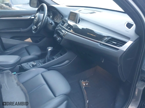2017 BMW X1 xDrive28i with VIN WBXHT3C33H5F87591, listed as a IAAI auction lot 41256899 with 69,362 mi miles. Bid and sale history available at carsss.com. Image 5.