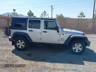 2008 Jeep Wrangler Unlimited X with VIN 1J4GA39168L592999, listed as a IAAI auction lot 42699909 with 158,128 mi miles and . Bid and sale history available at DreamBid. Image 13.