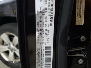 2014 Jeep Compass Latitude with VIN 1C4NJDEB3ED623018, listed as a Copart auction lot 69662954 with 121,115 mi miles and Salvage Title. Bid and sale history available at carsss.com. Image 13.
