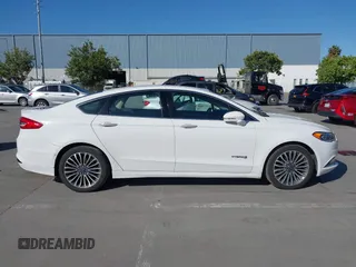 2017 Ford Fusion Hybrid Titanium с VIN 3FA6P0RU3HR323164, выставлен на аукционе IAAI как лот 42303571 с пробегом 119 732 миль миль и . История ставок и продаж доступна на DreamBid. Изображение 14.