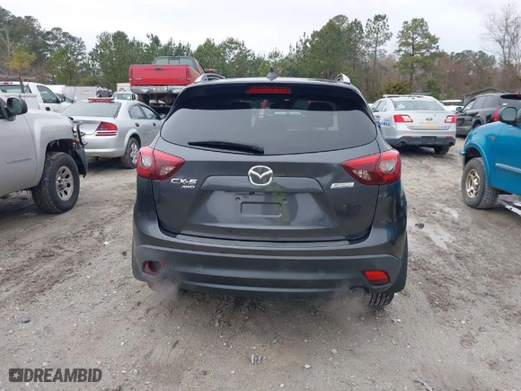 2016 Mazda CX-5 Grand Touring with VIN JM3KE4DY8G0796290, listed as a IAAI auction lot 41619977 with NaN miles. Bid and sale history available at carsss.com. Image 16.