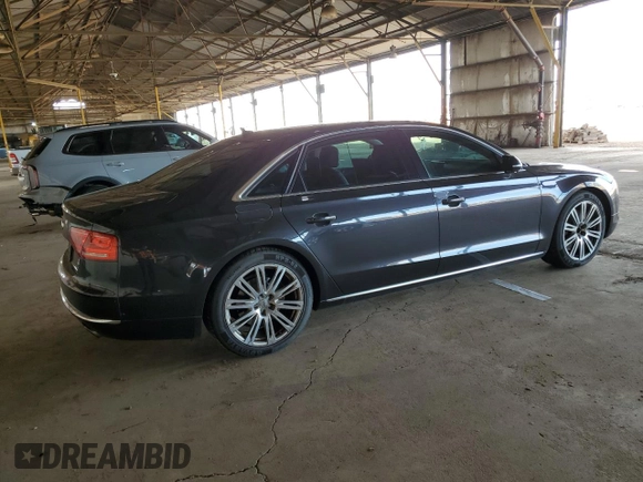2011 Audi A8 with VIN WAURVAFD4BN004628, listed as a Copart auction lot 52244125 with 182,631 mi miles and Clean title. Bid and sale history available at DreamBid. Image 3.