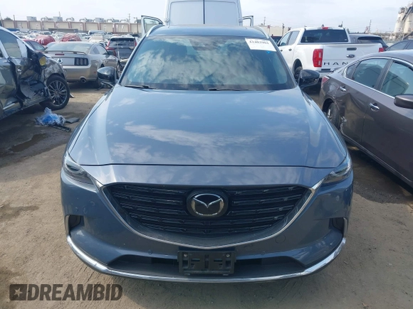 2021 Mazda CX-9 Carbon Edition z VIN JM3TCBDY0M0526352, wystawiony jako IAAI lot #42403901 z przebiegiem 50 193 mil mil oraz . Historia ofert i sprzedaży dostępna na DreamBid. Obrazek 12.