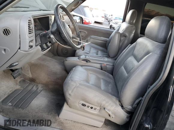 1999 Chevrolet Tahoe with VIN 3GNEC18R1XG143882, listed as a Copart auction lot 42177005 with 130,368 mi miles and Salvage title. Bid and sale history available at DreamBid. Image 7.