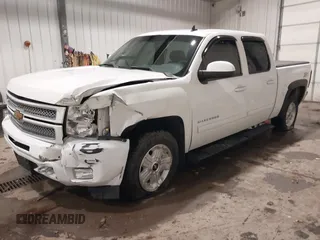 2012 Chevrolet Silverado 1500 LT with VIN 3GCPKSE72CG152890, listed as a IAAI auction lot 41589760 with 170,937 mi miles and . Bid and sale history available at DreamBid. Image 17.