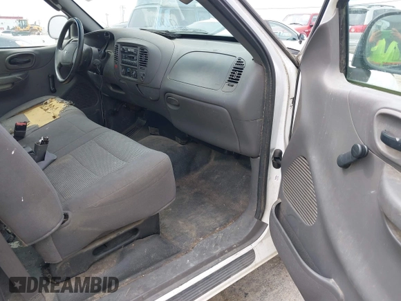 2002 Ford F-150 XL with VIN 1FTRF172X2KE34789, listed as a IAAI auction lot 42138397 with 188,960 mi miles and . Bid and sale history available at DreamBid. Image 5.