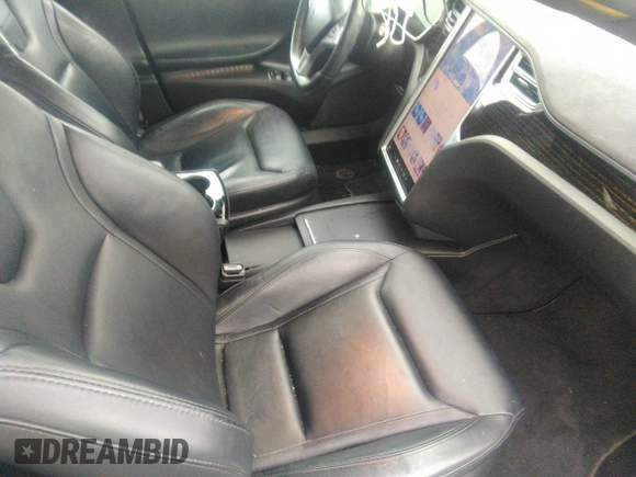 2016 Tesla Model S 70 with VIN 5YJSA1E13GF174542, listed as a IAAI auction lot 41169279 with 72,691 mi miles and . Bid and sale history available at DreamBid. Image 5.