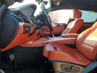 2012 BMW X6 M with VIN 5YMGZ0C59CLK14863, listed as a Copart auction lot 87869855 with 0 mi miles and Salvage Title. Bid and sale history available at carsss.com. Image 7.
