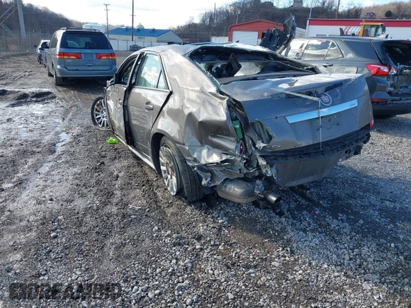 2012 Cadillac CTS Luxury z VIN 1G6DG5E53C0129159, wystawiony jako IAAI lot #41476575 z przebiegiem 97 676 mil mil oraz . Historia ofert i sprzedaży dostępna na DreamBid. Obrazek 3.