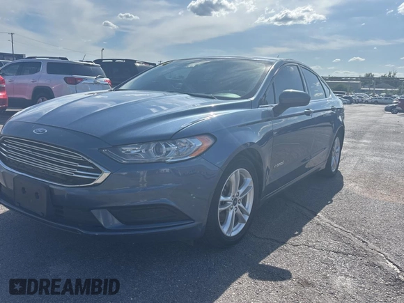 2018 Ford Fusion Hybrid SE with VIN 3FA6P0LU7JR261105, listed as a Copart auction lot 55692065 with 122,782 mi miles and Clean Title. Bid and sale history available at carsss.com. Image 2.