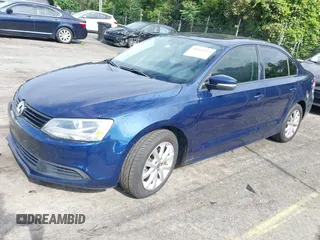 2012 Volkswagen Jetta SE with VIN 3VWDX7AJ1CM389470, listed as a IAAI auction lot 41011343 with 133,295 mi miles and . Bid and sale history available at DreamBid. Image 2.