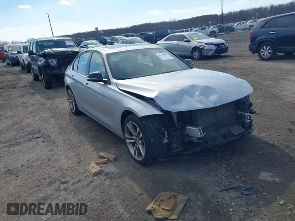 2014 BMW 3 Series 328i xDrive with VIN WBA3B3C58EJ980379, listed as a IAAI auction lot 41678676 with 183,278 mi miles. Bid and sale history available at carsss.com. Image 1.