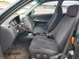 2002 Mazda Protege LX z VIN JM1BJ226920510014, wystawiony jako Copart lot #59285995 z przebiegiem 235 652 mil mil oraz Szkoda całkowita • Salvage title. Historia ofert i sprzedaży dostępna na DreamBid. Obrazek 7.