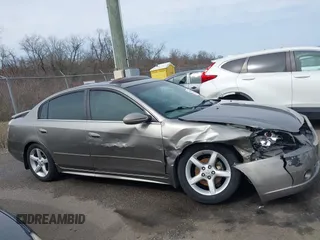 2006 Nissan Altima SL z VIN 1N4BL11D96C251717, wystawiony jako IAAI lot #41566215 z przebiegiem 189 431 mil mil oraz . Historia ofert i sprzedaży dostępna na DreamBid. Obrazek 13.