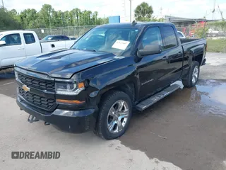 2018 Chevrolet Silverado 1500 Custom with VIN 1GCRCPEC3JZ329430, listed as a IAAI auction lot 42122097 with 199,580 mi miles. Bid and sale history available at carsss.com. Image 2.